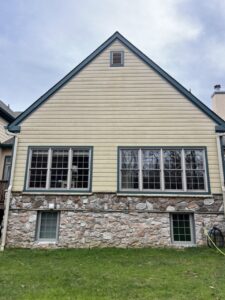 Soft wash vinyl siding before