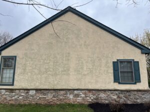 Soft wash stucco siding before